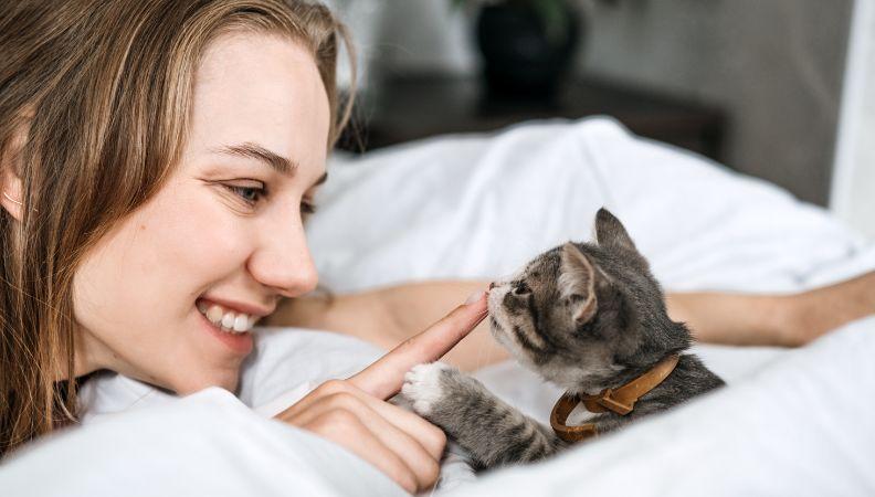 A happy owner and her adopted cat