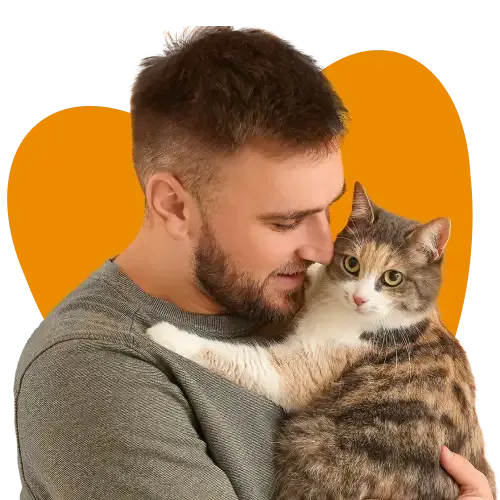 Man cuddling his cat