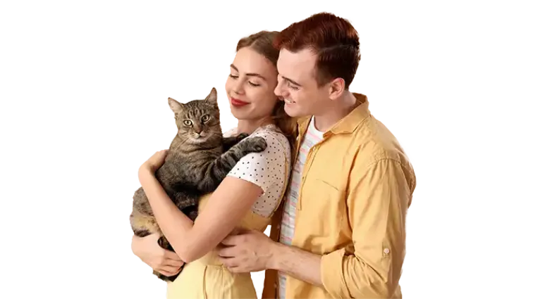 Couple cuddling their cat